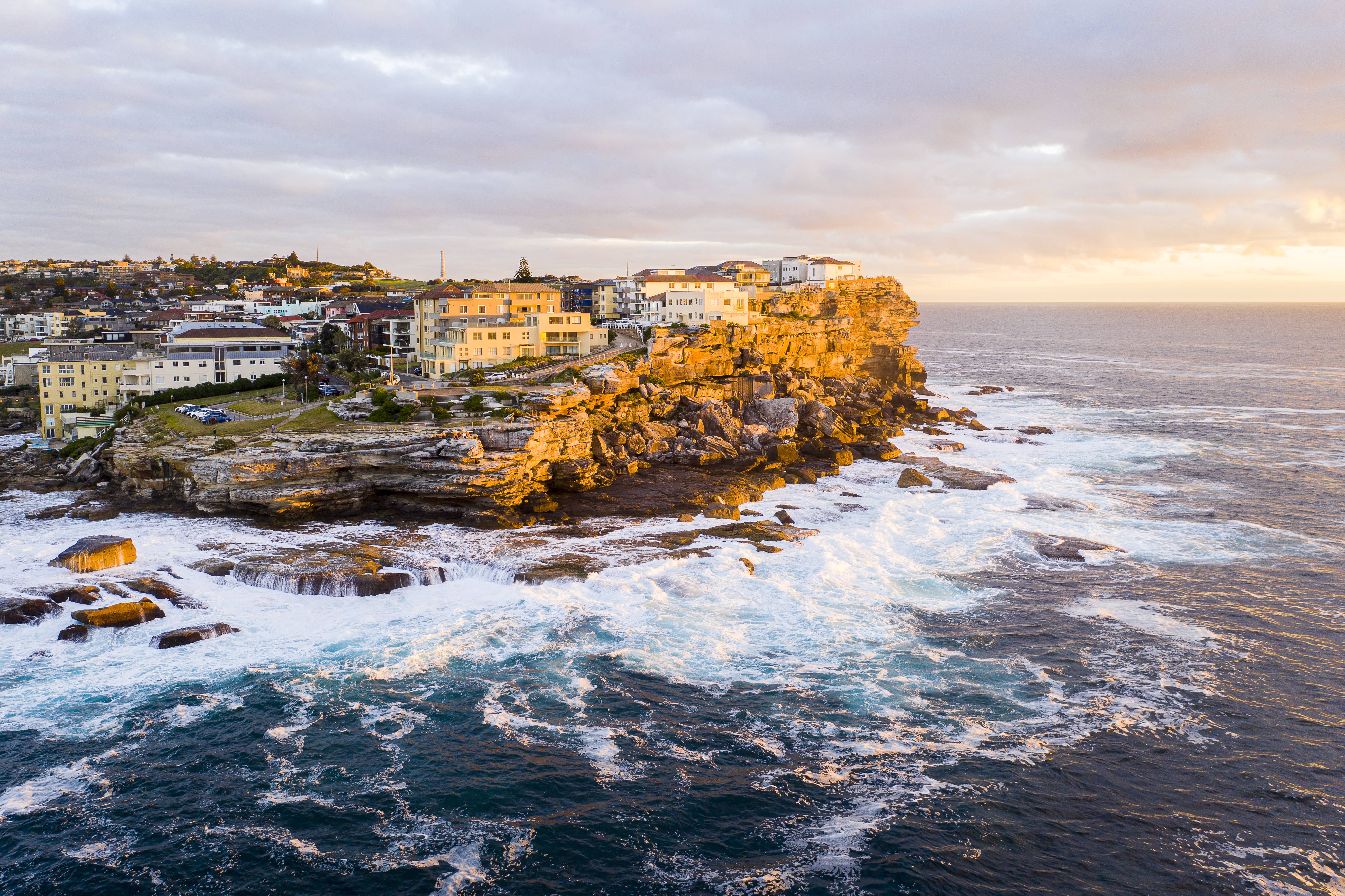 Golden sunrise over Ben Buckler Bondi headland aerial wall art print”