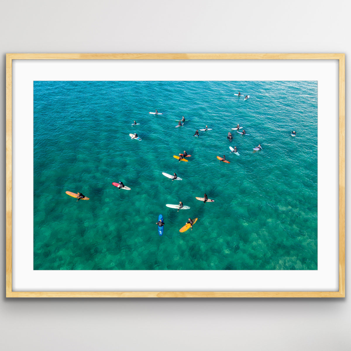 Surfers sitting on boards at Bondi Beach drone photography print