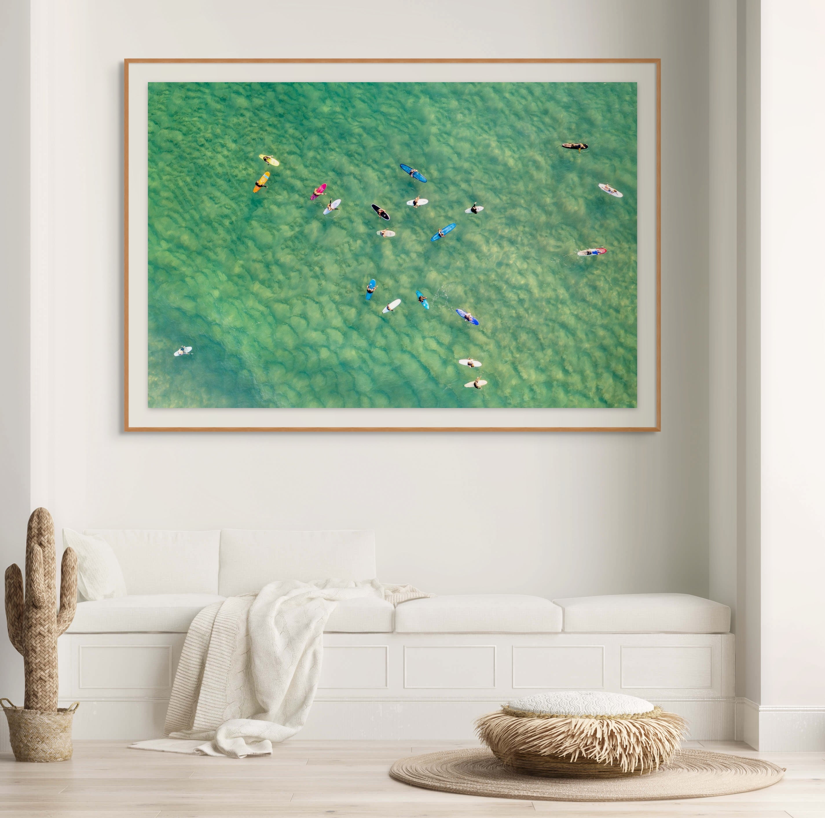 Aerial photograph of surfers scattered across Bondi ocean wall ar