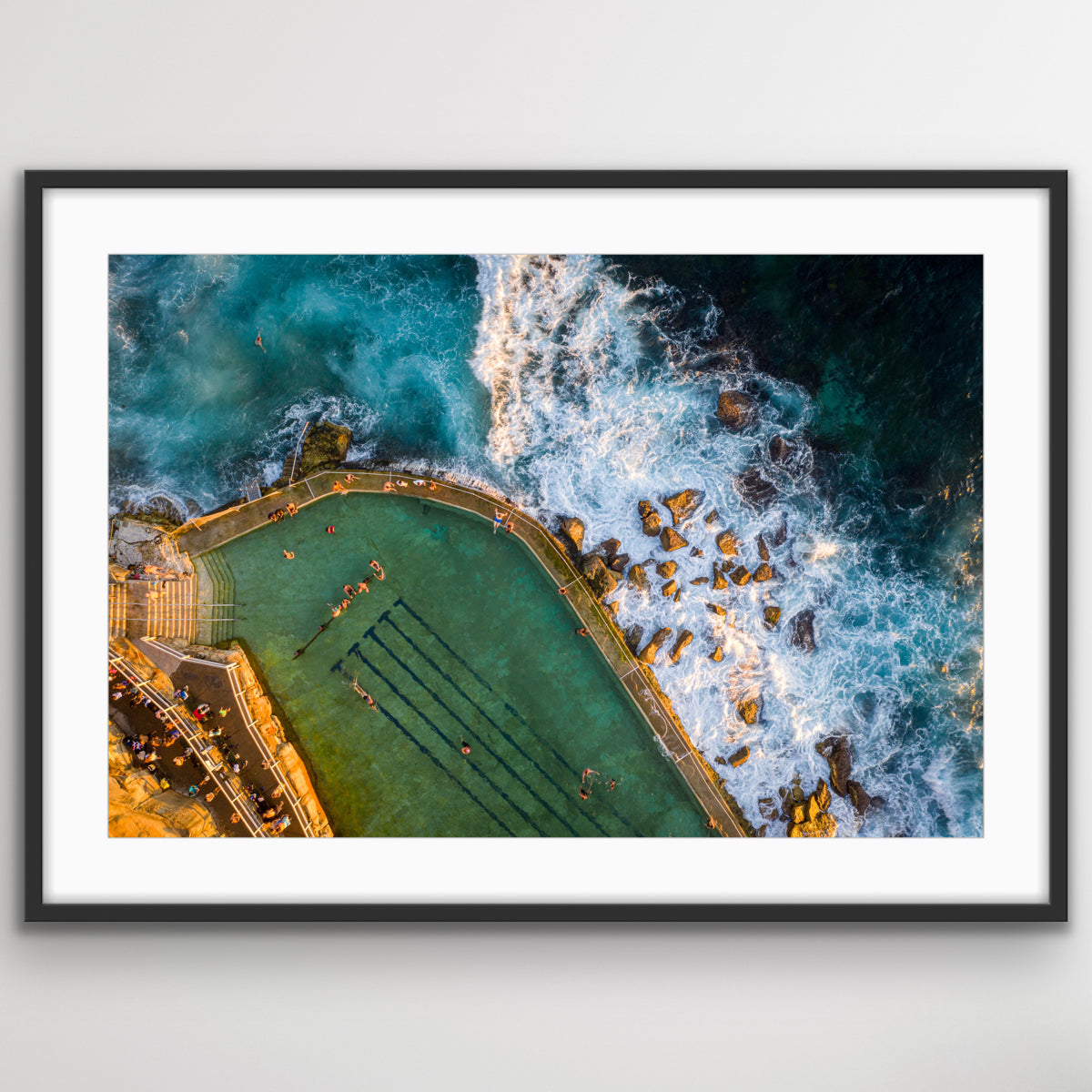 Aerial photograph of Bronte Pool with warm sunlit tones wall art print